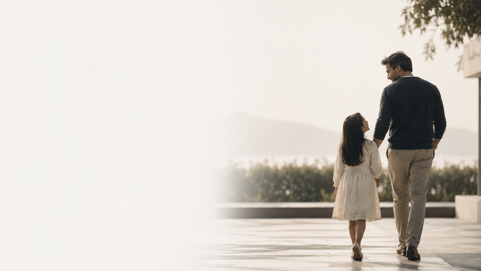 A father and daughter walking together